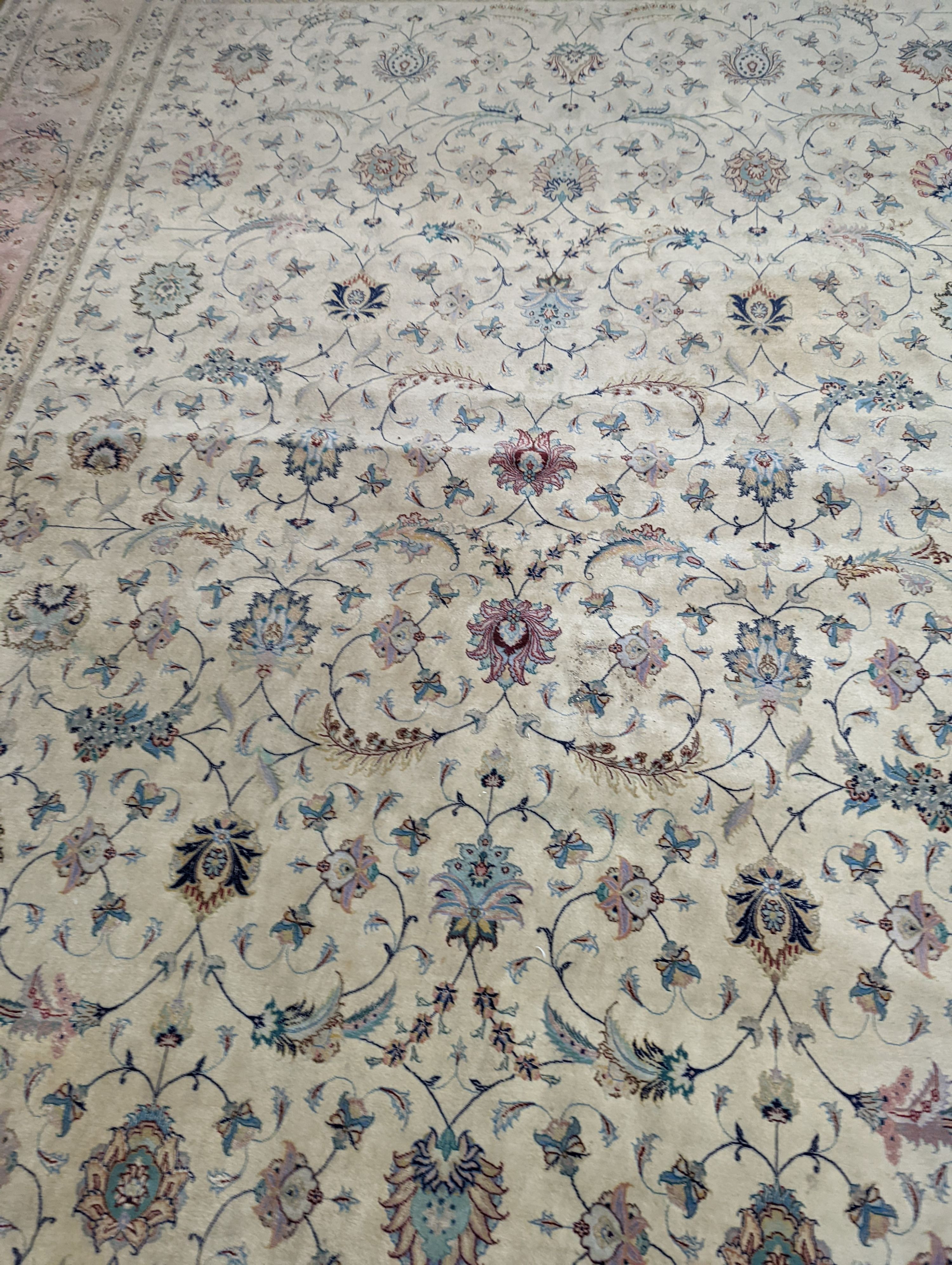 A Persian Tabriz ivory ground carpet, 410 x 300cm